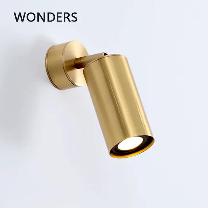 Applique murale LED réglable en laiton doré