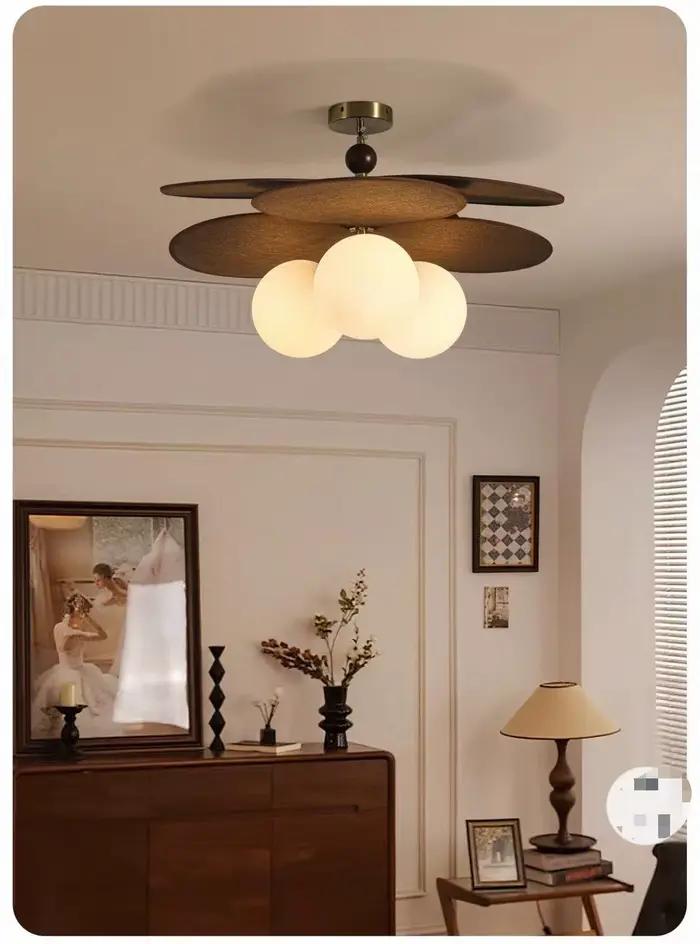 Lustre suspendu vintage en rotin tressé