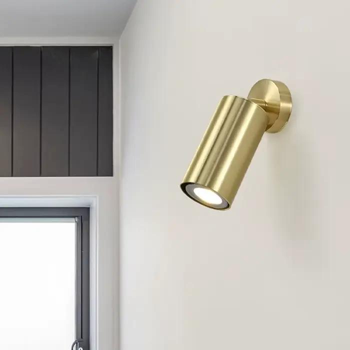 Applique murale LED réglable en laiton doré