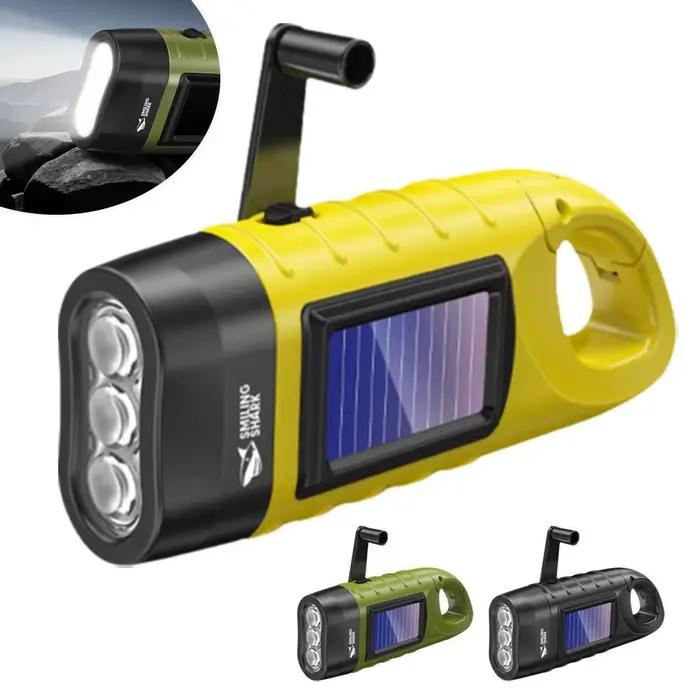 Lampe de poche LED énergie solaire pour camping alpinisme et situations d'urgence trois couleurs émission ABS robuste recharge manivelle ou énergie solaire distance d'éclairage 100-200 mètres